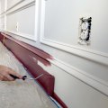 Why New Trim Highlights Old Wall Imperfections After Painting